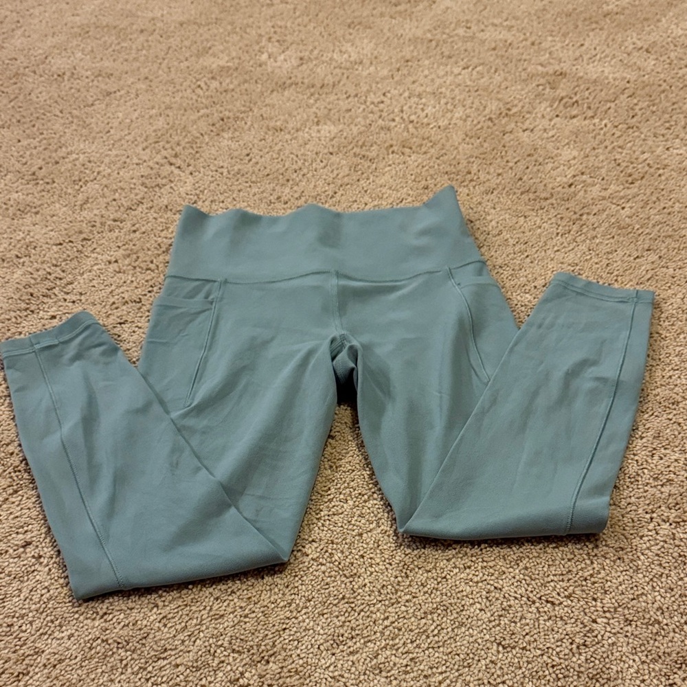 Athleta Salutation Stash Pocket 7/8 Leggings